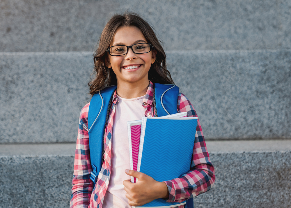 Elementary school student wearing glasses