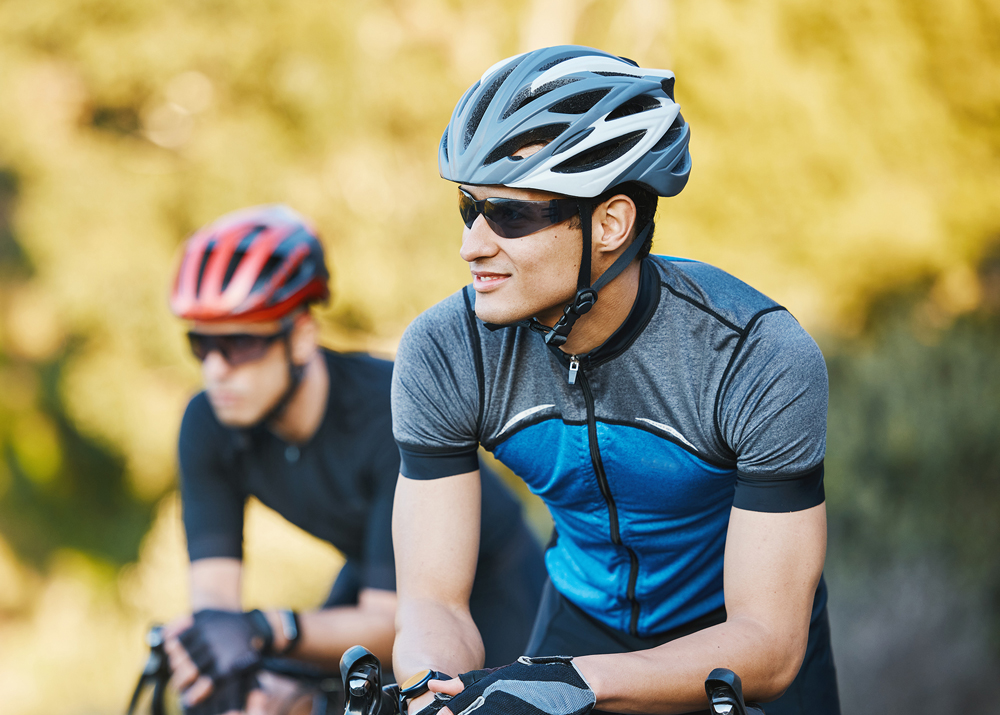 Cyclists wearing sun glasses