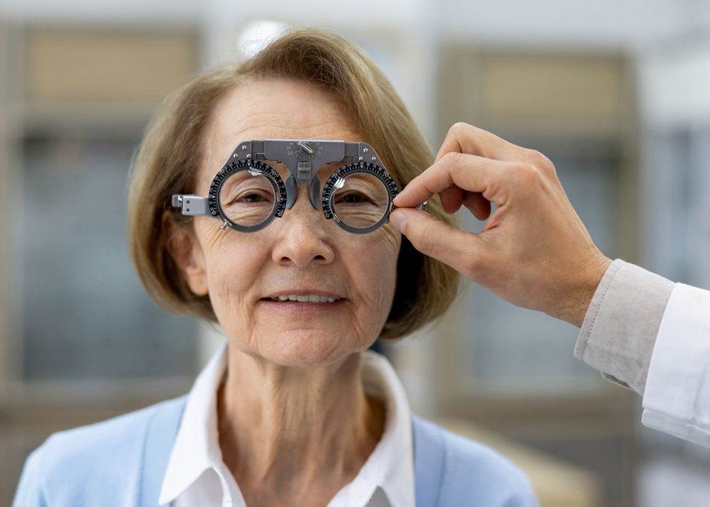 Elderly woman getting an eye exam