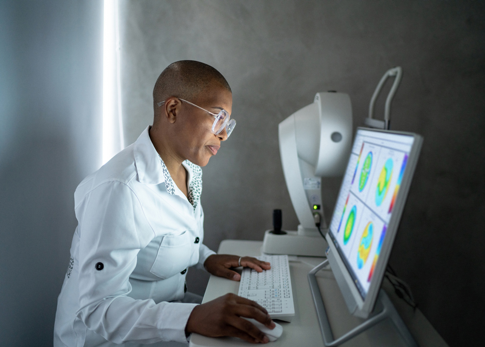 Optometrist looking at computer screen