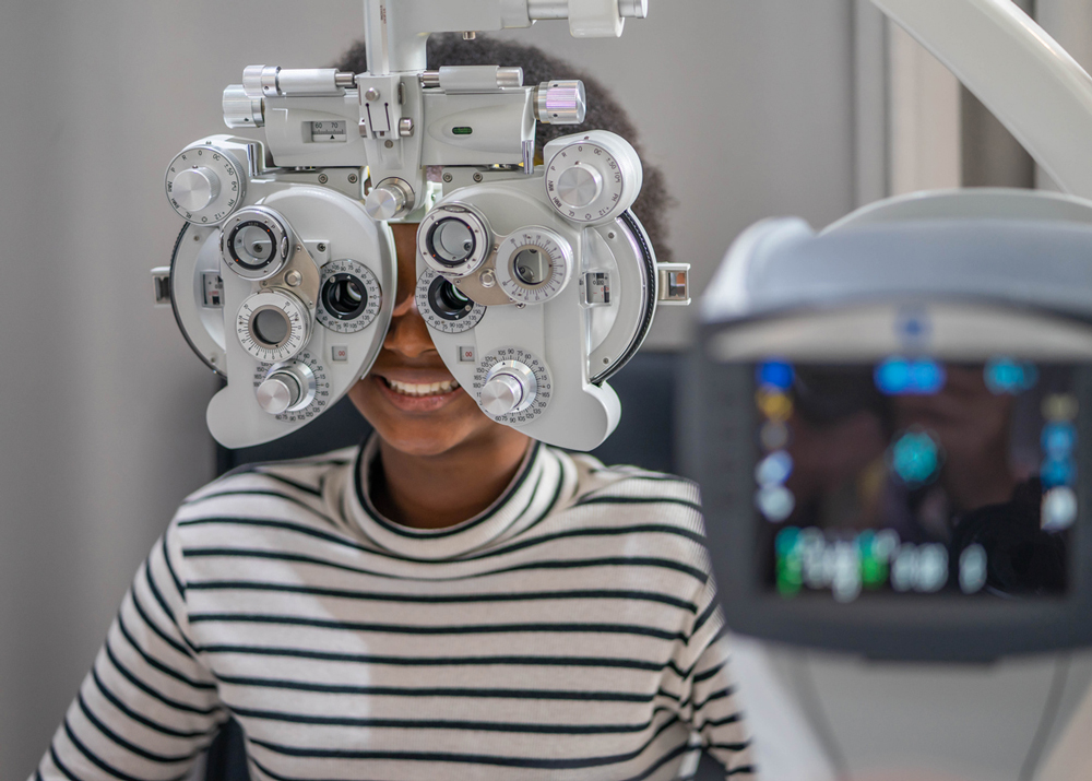 Teen girl gets an eye exam